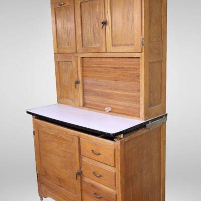 Antique Hoosier cabinet with enamel counter top