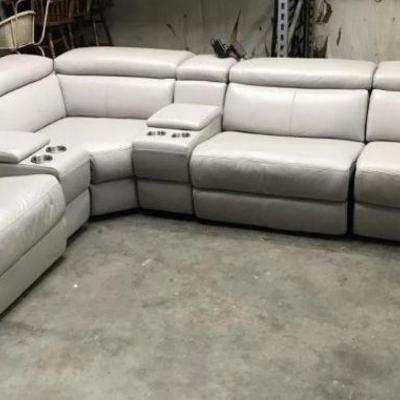 Lot # : 2 - 6 Piece Dove Grey Leather Sectional
Made by Leo Raf Power Sectional. Measures 135" x 103" (11'3" x...