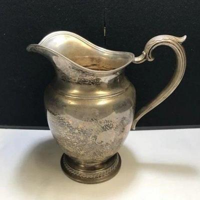 Lot # : 63 - Rogers Sterling Silver Pitcher 4 1/8 Pints
Pitcher weighs 594 grams of Sterling Silver.
