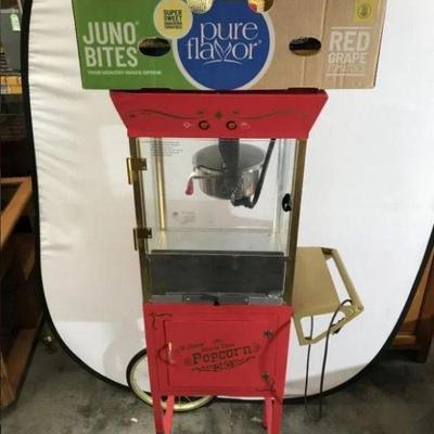 Lot # : 207 - Movie Time Theatre Popcorn Machine
Made by Nestalgia and is 2 pieces - popcorn machine sets on top of a rolling cart and...