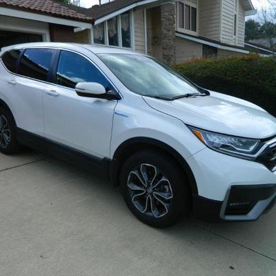 2022 Honda AWD hybrid CR-V Ex-L with only 22,000 miles.  This car is available for pre sale and is in excellent condition both visually...