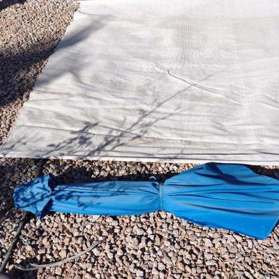 Coolaroo tan awning drape blue patio umbrella