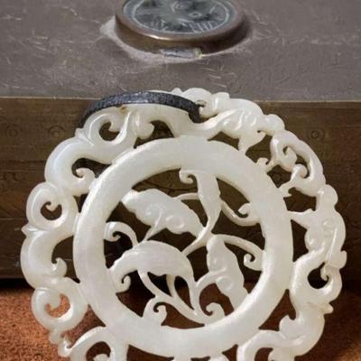 Asian carved stone medallion
