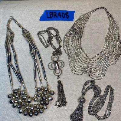 https://ctbids.com/estate-sale/34051/item/3810272/Faux-Silver-Extravaganza