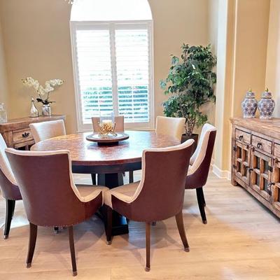 Copper hammer around dining room table and chairs