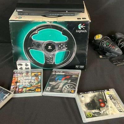 Playstation 3 gaming bundle with logitech steering wheel and games