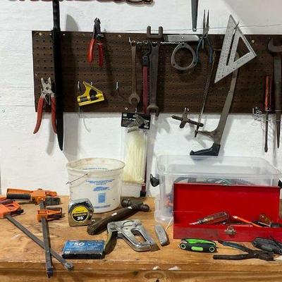 Workbench with hand tools and rear axle bearing puller set