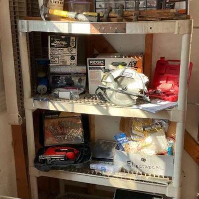 Versatile workshop tool collection with ryobi circular saw with laser