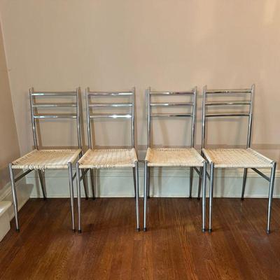 (4pc) Chrome Dining Chairs | Set of chrome framed dining chairs with plastic woven seats. Seat height: 18"H - h. 35 x w. 15 x d....