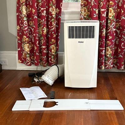 Haier Portable Air Conditioner | Haier Portable Air Conditioner with ventilation hose, window outlet, user manual and remote control. -...