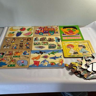 (9pc) Children's Wooden Puzzles | Children's wooden puzzles with multiple themes and easily removable puzzle pieces.

