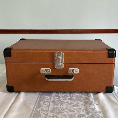 Crosley Record Player | Crosley model CR-49 portable vinyl record player in a brown leather carrying case. - h. 8 x w. 16.75 x d. 11 in

