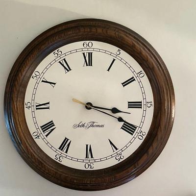 Seth Thomas Wall Clock | Vintage Seth Thomas round wall clock with wood grain frame and roman numerals (#2747) - dia. 13.5 in

