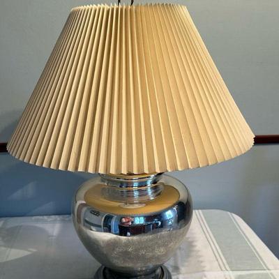 Mercury Glass Table Lamp | Vintage distressed mercury glass table lamp with pleated lampshade. - h. 23 in (to Finial)

