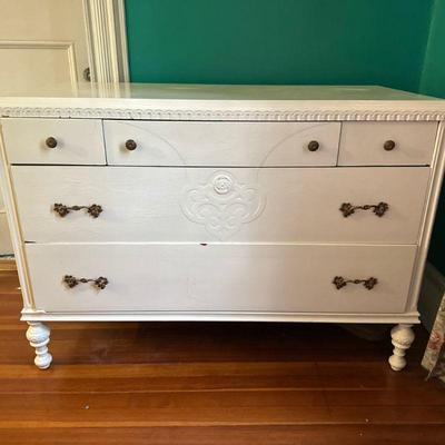 White Dresser with Five Drawers | White painted dresser with five drawers and intricate carved motifs and original hardware. - h. 34 x w....