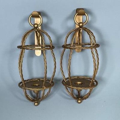 Twisted metal sconces