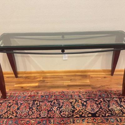 Glass-Top Console Table - Black Metal Accents, Curved Frame Design	