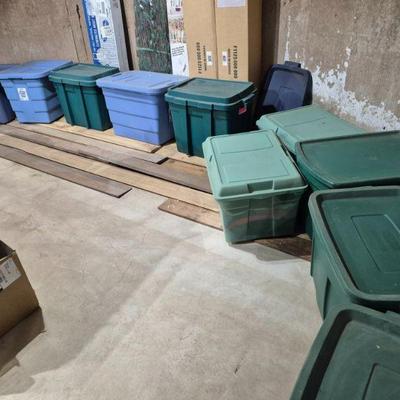 Bins are full of women's clothing. Sizes small, medium and large 