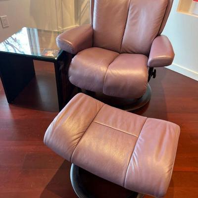 Leather padded chair with footstool