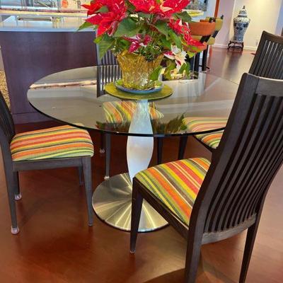 Glass pedestal table and chairs