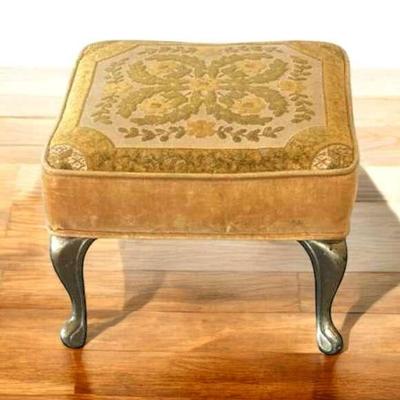 Vintage foot stool with brass legs