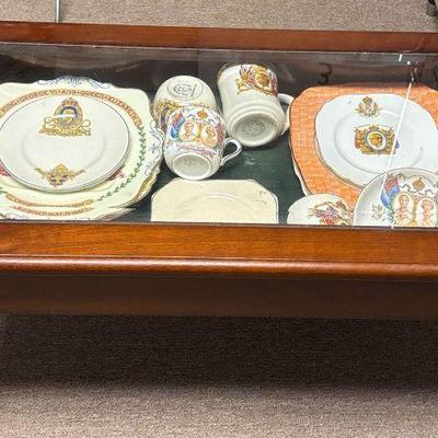 Curio table with british royal family collectibles