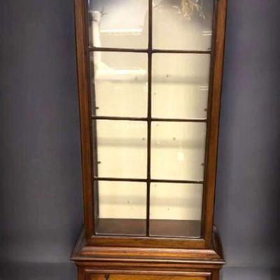Petite curio cabinet with two drawers
