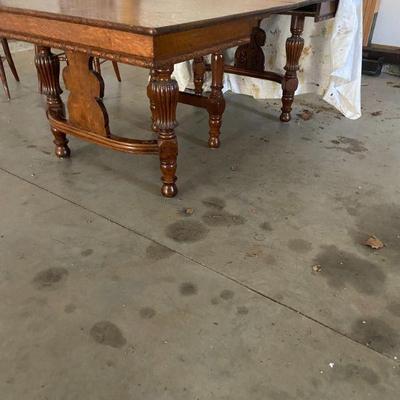 Table shown with two leaves.  There is also a third.