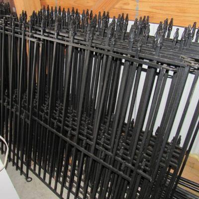 Metal fence- 23 panels total.  Each panel measures 40" tall and 46" wide.  Everything to reassemble is there.