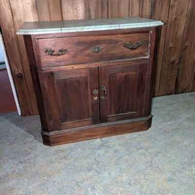 Marble topped side board