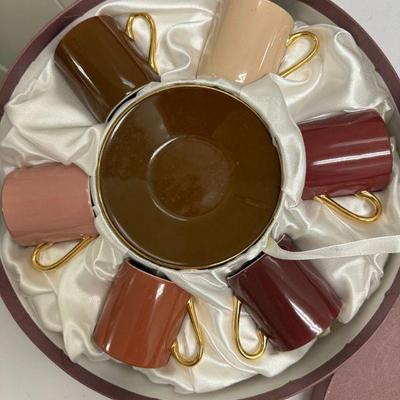 (12pc) Coffee & Tea Set | Vintage pink/magenta coffee and tea set with silk lined box Cups: h. 2 in. Saucer: dia. 4 in.

