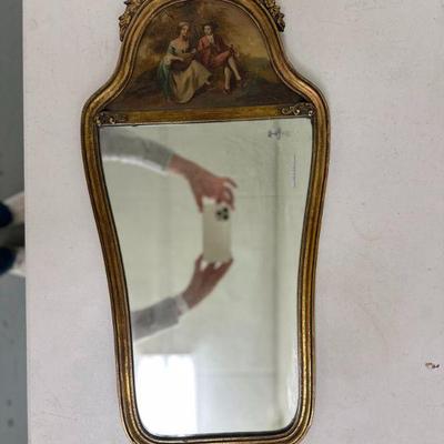 French Louis XVI Mirror | Vintage French Louis XVI style mirror with hand-painted scene of a couple in ornate gold frame. Signed by the...