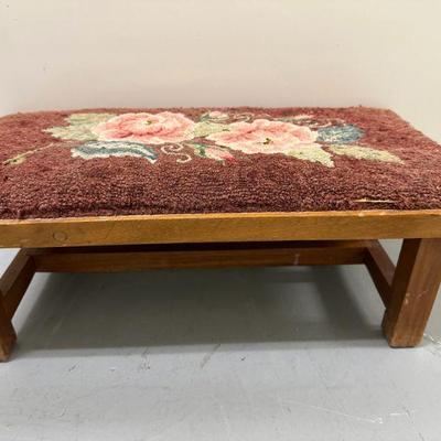 Latch-Hook Footstool | Wooden foot stool with floral fabric design, appears to be latch-hook. - h. 7.5 x w. 22 x d. 11.5 in

