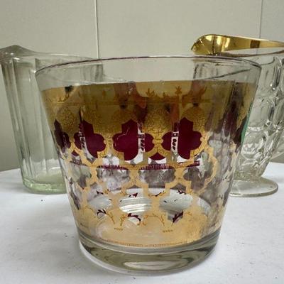 (3pc) Mid-Century Pitchers | Miscellaneous mid-century glassware including: Ice bucket: dia. 6 in. Glass pitcher with gold-trimmed lip...