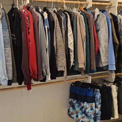 Full closet of men's clothing 