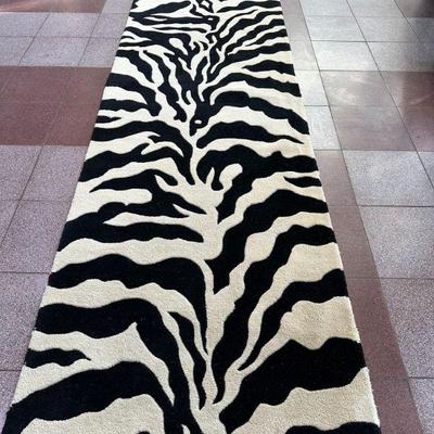 Zebra Runner Rug | Zebra-patterned runner rug.

