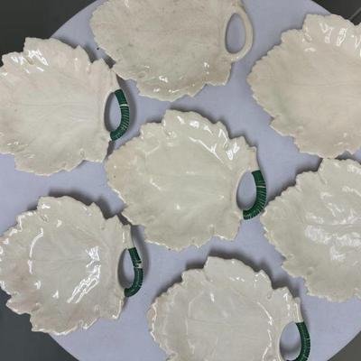 (7pc) Leaf-Shaped Plates | Leaf-shaped salad plates, white with green accent (unmarked) - w. 8.5 x d. 7.5 in

