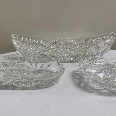 (3pc) Crystal Dishes | Long: h. 2.5 in. x w. 12 in. Middle: h. 2 in. x w. 7 in. Round: h. 1 in. x w. 5 in.

