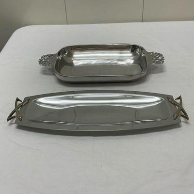 (2pc) Nambe Tray & Other | Nambé tray: 15 in. x 7.5 in. Metal (unmarked) tray: 17 in. x 6.5 in.


