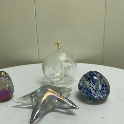Misc. Paperweights | Miscellaneous paperweights including: Starfish-shaped glass paperweight Egg-shaped glass paperweight Abstract-shaped...