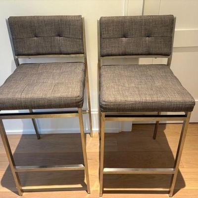 (2pc) Counter-Height Stools | Counter-height stools with gray cushions and chrome frame; seat h. 26 in. seat. - h. 36 x w. 16 x d. 17 in

