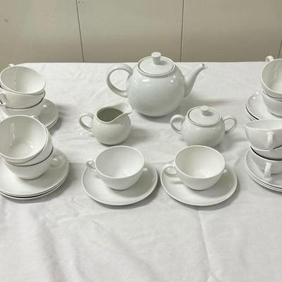 (32pc) Ceramic Tea Set | Pitcher: 5 in. x 9 in. Sugar: 5.5 in. x 3.5 in. Creamer: 5 in. x 3.5 in. 14 Teacups: 3.5 in. 14 Saucers: 6 in.

