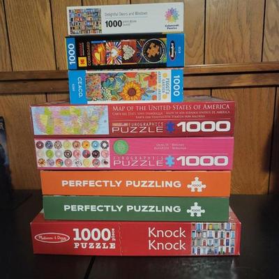 140 eight1000piecepuzzles