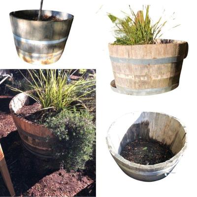 113 fourwoodenbarrelstyleoutdoorplanters