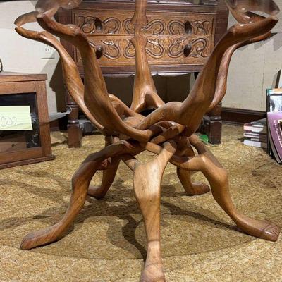 Wood carved interlock 5 leg table with glass top