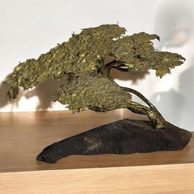 Brutalist style wind swept" tree sculpture