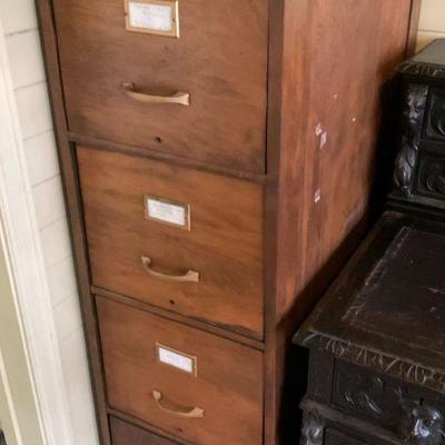 Four drawer wooden file cabinet