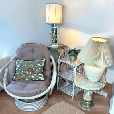 White rattan lounge chair lighting, tables and book case