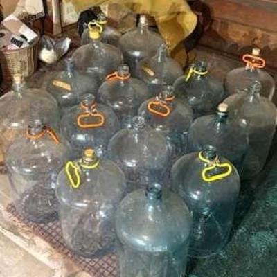 17 large glass bottles water or wine making