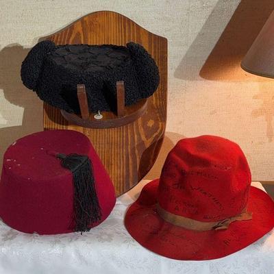 A trio of hats matador fez & autographed felted hat